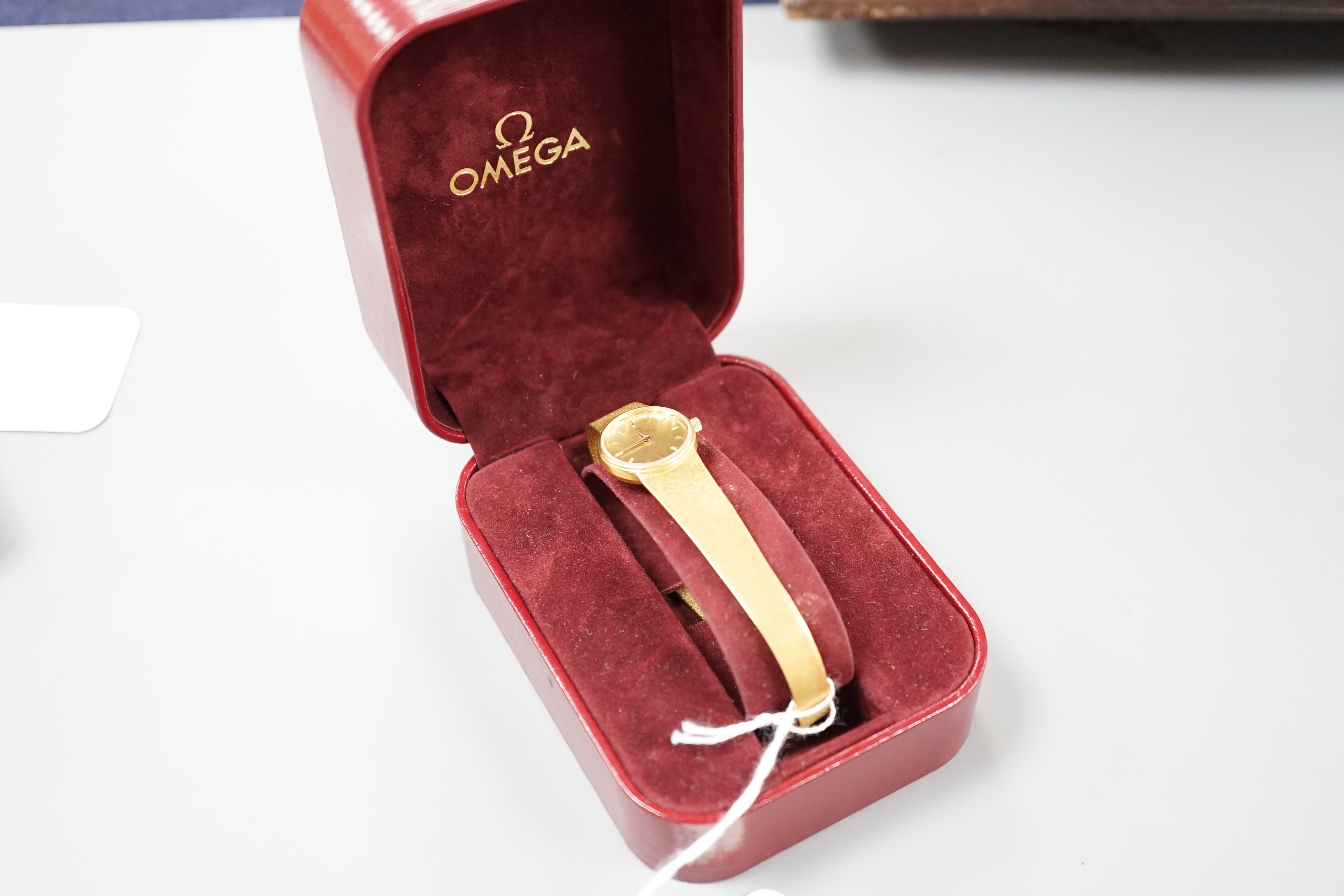 A lady's 18ct gold Omega quartz wrist watch